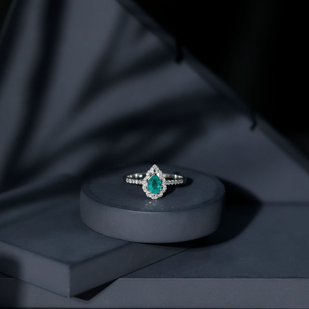 Emerald Engagement Ring – Pear Shaped Ring with Diamond Halo and Leaf Pattern