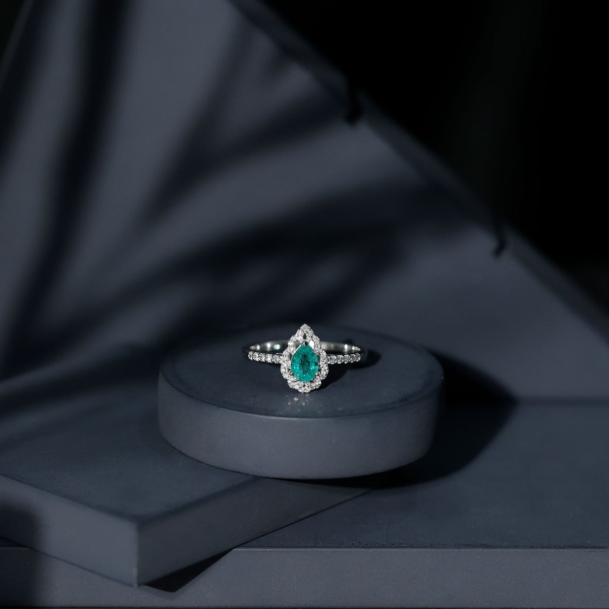 Emerald Engagement Ring – Pear Shaped Ring with Diamond Halo and Leaf Pattern