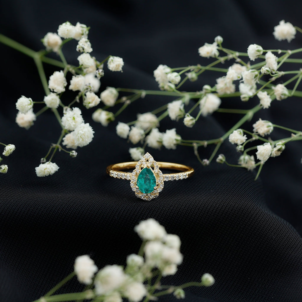 Emerald Engagement Ring – Pear Shaped Ring with Diamond Halo and Leaf Pattern