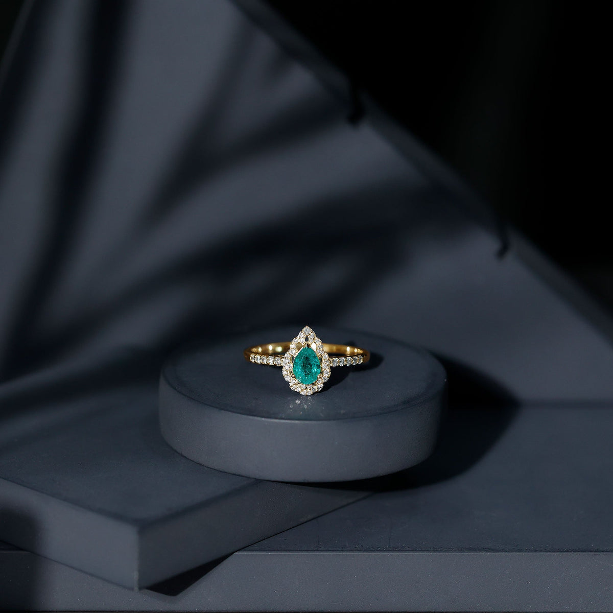 Emerald Engagement Ring – Pear Shaped Ring with Diamond Halo and Leaf Pattern