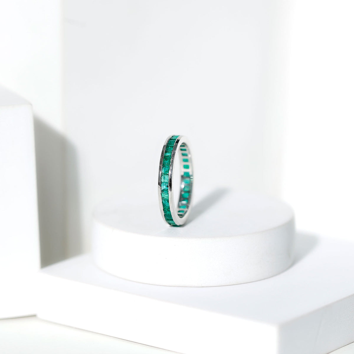 Emerald Eternity Band – Princess Cut Channel Set Ring With Structured Design