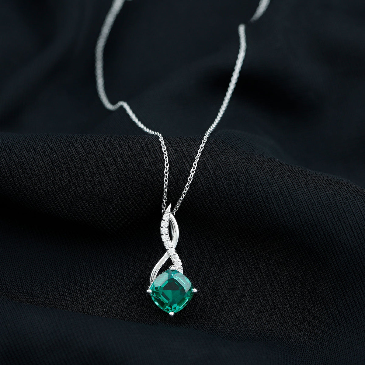 Emerald Infinity Necklace – Lab Created Emerald & Sparkling Moissanite Pendant