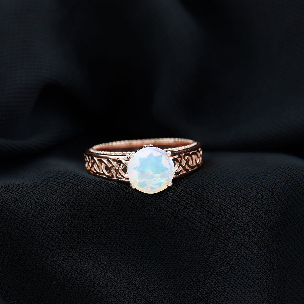 Ethiopian Opal Celtic Knot Engagement Ring with Surprise Diamond