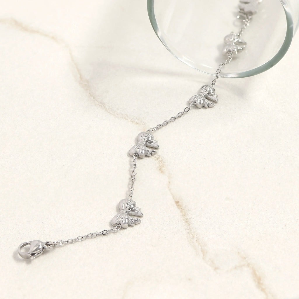 Gold Bow Bracelet – Adjustable Stainless Steel Chain | Polished Gold Tone Jewelry - bracelet | Sunflower Soul Boutique