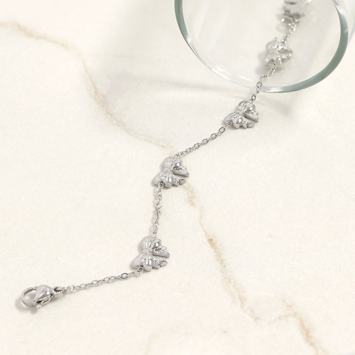 Gold Bow Bracelet – Adjustable Stainless Steel Chain | Polished Gold Tone Jewelry - bracelet | Sunflower Soul Boutique
