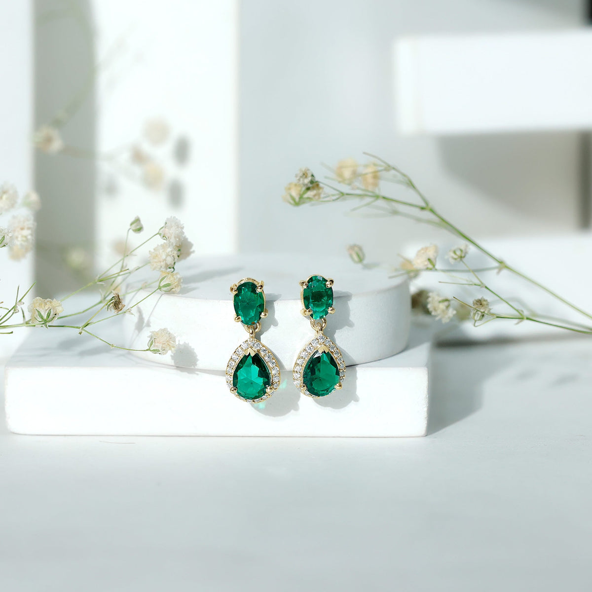 Lab Created Emerald Earrings – Classic Dangle Pear & Oval Halo Moissanite Design