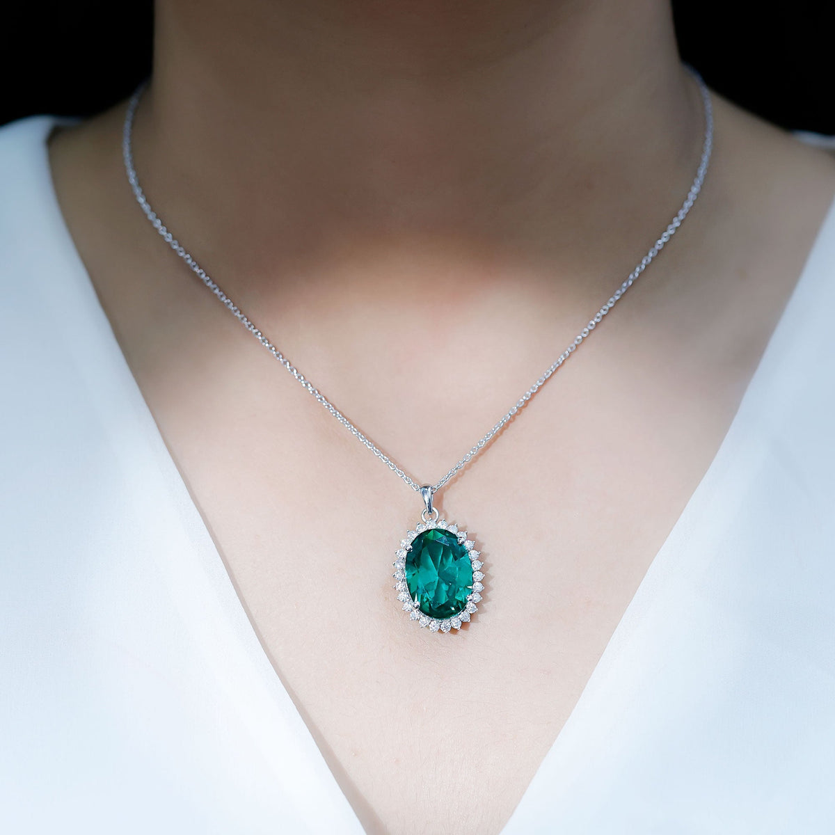 Lab Grown Emerald Necklace – 14 Carat Oval Halo Pendant With Silver Chain