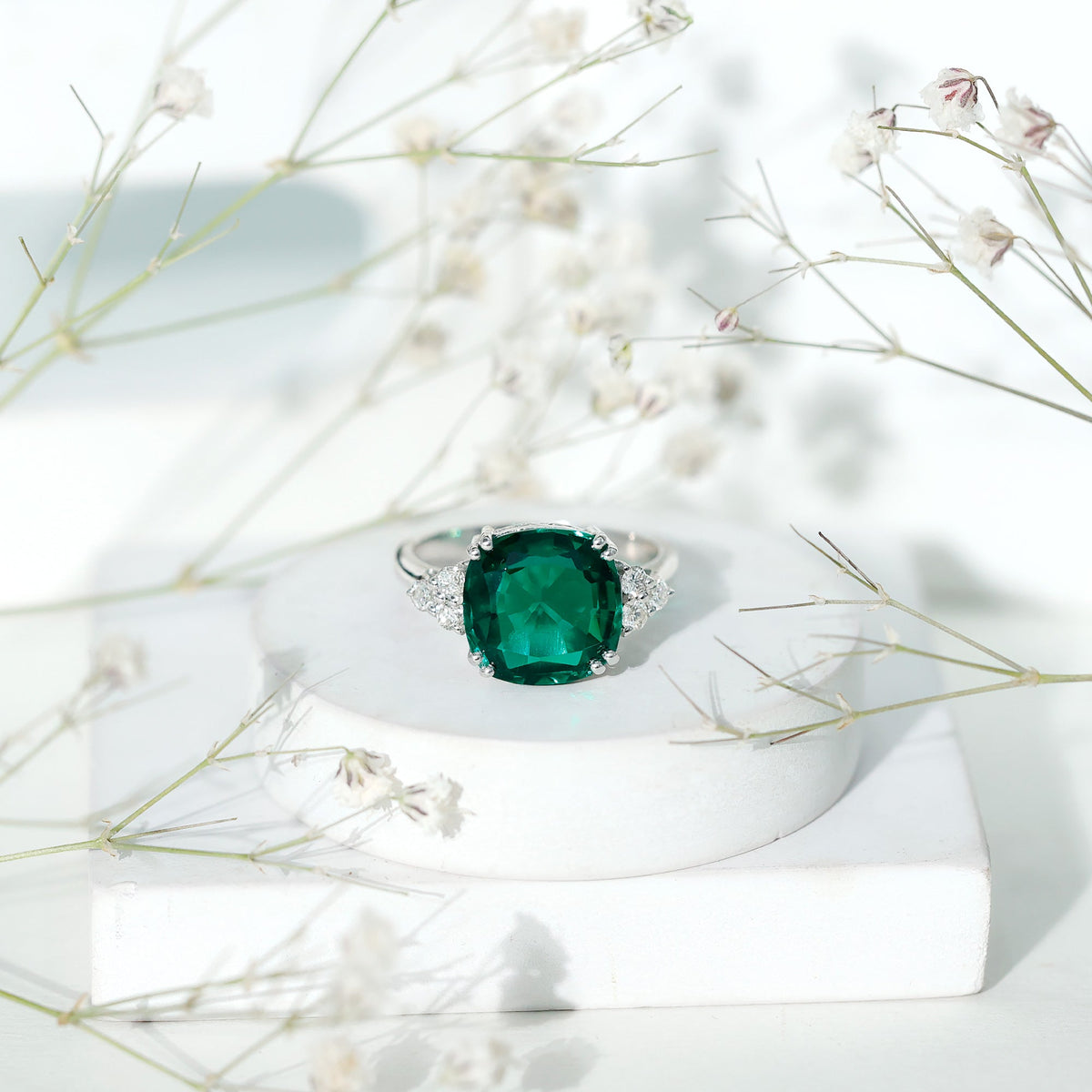 Lab Grown Emerald Ring – 9 Carat Cushion Cut Engagement Ring with Diamond Trio