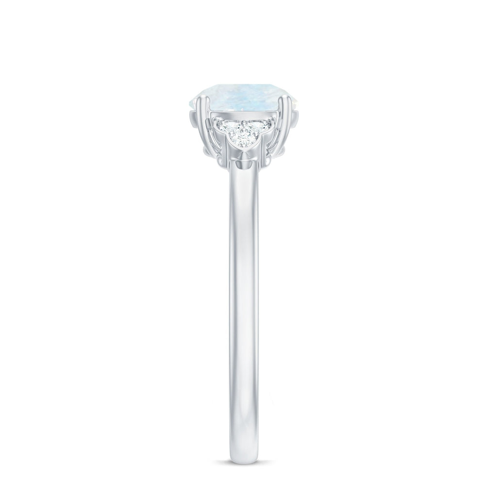Moonstone Engagement Ring – Solitaire Blue Gemstone With Diamond Trio In Gold