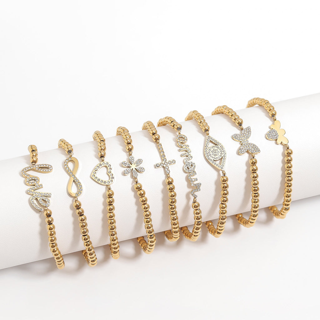 Gold Beaded Bracelet – Adjustable Stretch Band with Stone Cross Charm